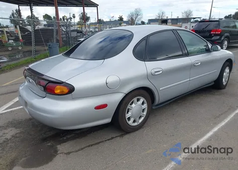 1996 Ford Taurus Gl z USA, uszkodzony, nr VIN 1FALP52U3TG298888